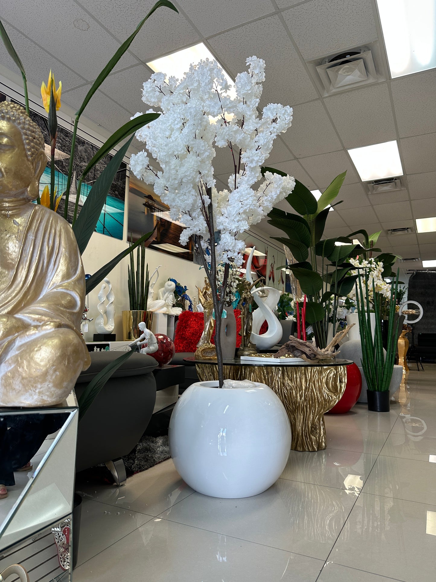 White Flower Arrangement in Round White Planter